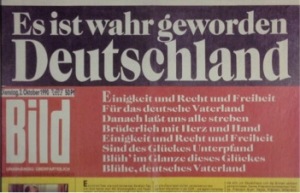 Newspaper headline says, Its Become a Reality, Germany 
